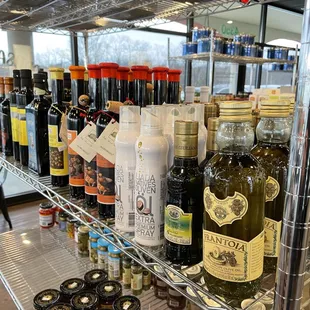 a variety of bottles of olive oil