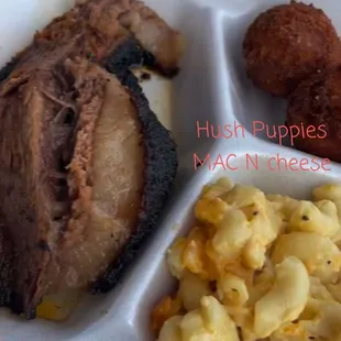 Sliced Beef brisket, Mac N cheese, hush Puppies