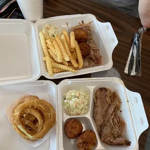 Top is large pulled pork plate, fries, slaw with hush puppies. The bottom small pulled pork plate with slaw, onion rings and hush puppies.