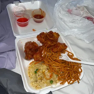 fried rice, chow mein, and orange chicken