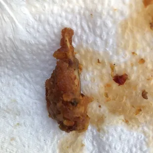 a piece of chicken on a napkin