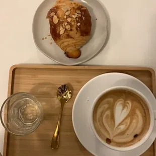 Almond croissant and Promised Land latte