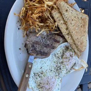 Grilled pork loin, hash browns and eggs. Very good!