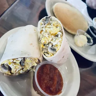 Sausage burrito with mushrooms and onions added. Yummy!