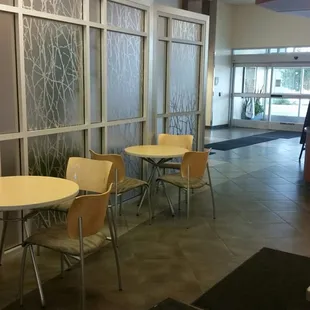 tables and chairs in a restaurant