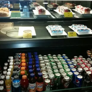 a display of drinks and desserts