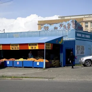 a blue building with a blue awning