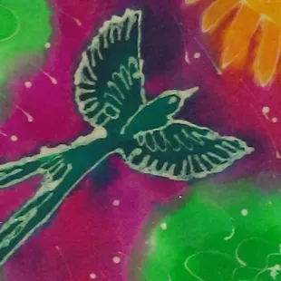 Adding paint to my fabric- white marks and lines are the dried wax