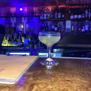 a martini on a bar counter