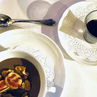 Chocolate-walnut sabayon with spiced red wine-glazed brioche croutons​​​​​​. Warm mulled wine shooter.