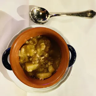 Potato-leek soup with bread, chestnuts, barley, and fontina​​​​​.