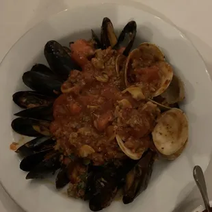 pasta with tomato sauce, mussels, and clams