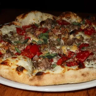 The Aosta Pizza was made with house-made sausage, charred pepper, roasted garlic, &amp; fontina.