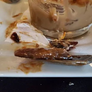 This is how thick the top layer was.. and it&apos;s burned too. You can still see a ton of sugar on the dessert glass itself.