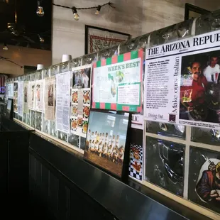 a bar with posters on the wall