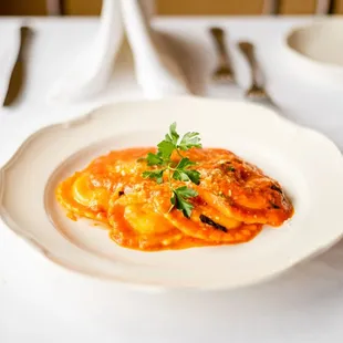 a plate of pasta on a table