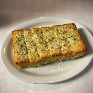two slices of bread on a white plate