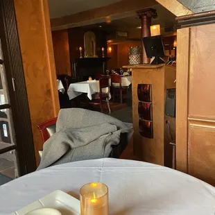 Quiet, socially distant table. Looking out to the main dining room.