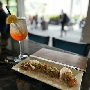 Spicy shrimp and an aperol spritz