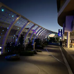 the outside of a building lit up at night