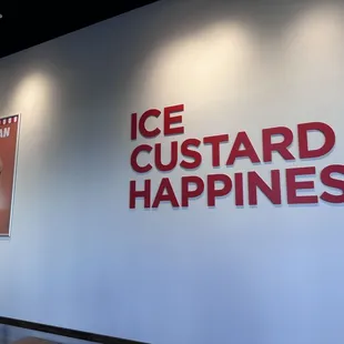 a sign that says ice custard happiness