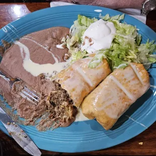 Full Chimichanga (2) plate stuffed with ground beef.