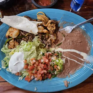 Lunch size Texas Fajita. Chicken, beef and shrimp. Loved it.