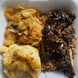 Jerk chicken (with rice, cabbage, and Mac and cheese)