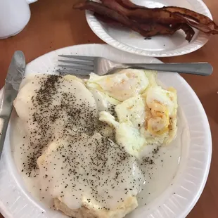 1 biscuit (huge/soft), 2 eggs over easy, w/ side of bacon.