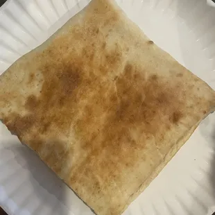 Half of a panini, just cheese (not on menu - ask them to make a panini with just cheese).