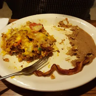 The food is hot and tasty like the salsa.  Service is friendly, quick.  The chips are thick and crispy.