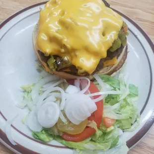 The Hunter hamburger. Double burger, green hatch chili and cheese. Comes with fries, tots or chips. This was so good. Very tasty beef