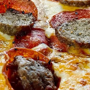 a pepperoni and sausage pizza