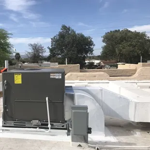 Lennox heating/cooling unit and attaching duct work.