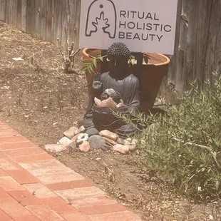 The sign by the entrance.