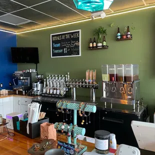 a bar with a variety of drinks