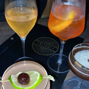 Champagne cocktail, aperol spritz, espresso martini
