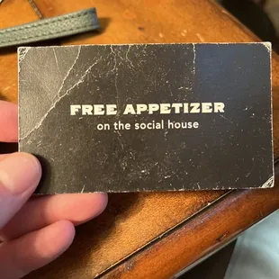 The back of the free appetizer card. No where does it state an entree is necessary.