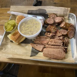 2 meat place with brisket, jalapeño sausage, and jalapeño Mac-n-cheese) French fries haven't arrived yet)