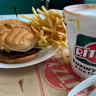 a burger and fries on a table