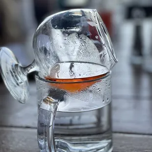 Cognac warmed over water.