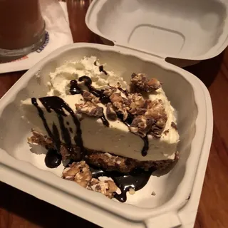 White Chocolate Snickers Cheesecake