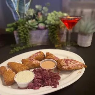 a plate of food and a cocktail