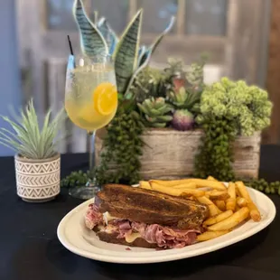 a plate of food and a drink