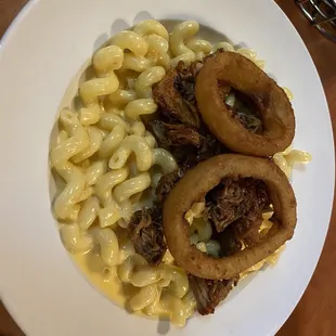 Mac &amp; Cheese with pulled pork &amp; crispy onion rings. Yum!