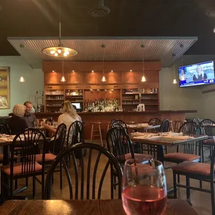 a view of the bar and dining area