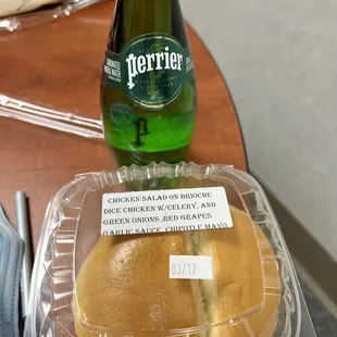 a sandwich and a bottle of water