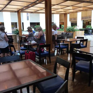 a restaurant with tables and chairs