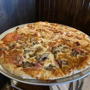 Rueben Pizza on half/ mushroom &amp; Canadian bacon on half