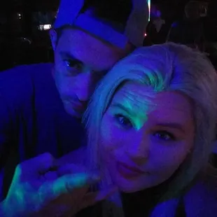 a man and a woman posing for a picture